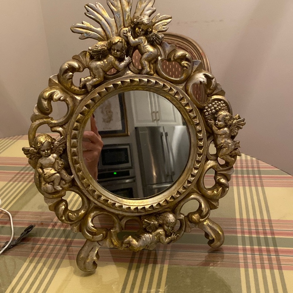 Vintage resin/wood(?) cherub mirror
